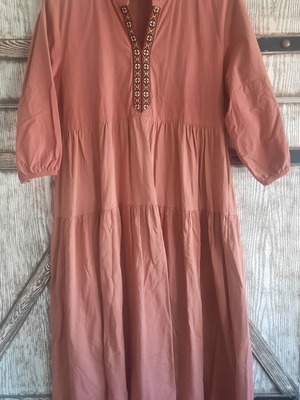 Pink dress used with added triangle for comfort underarm