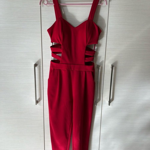 Red one-piece jumpsuit like new with side cutouts and bust support