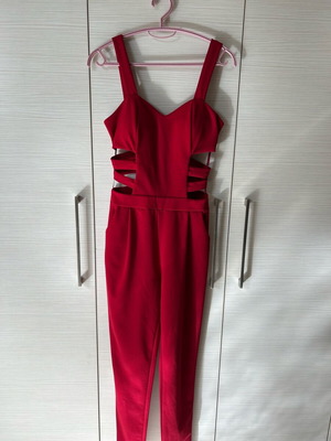 Red one-piece jumpsuit like new with side cutouts and bust support