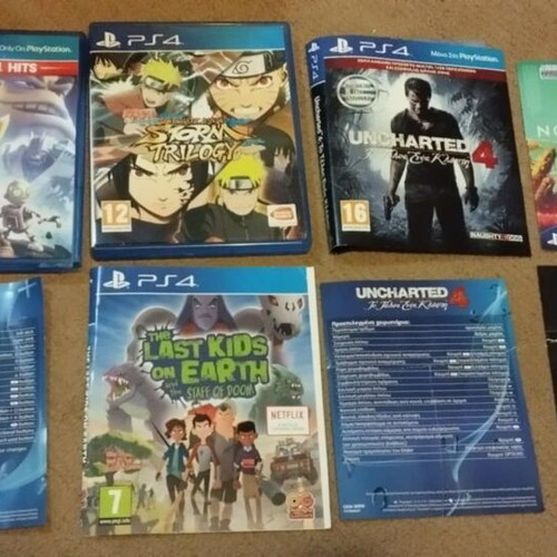 Set of 2 used PS4 game cases with covers and inserts