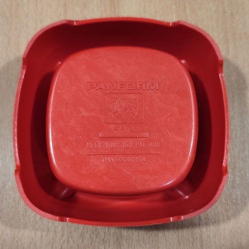 Ouzo 12 used red square plastic ashtray