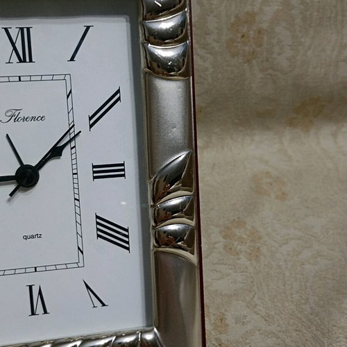 Clock with silver frame quartz used, table decorative