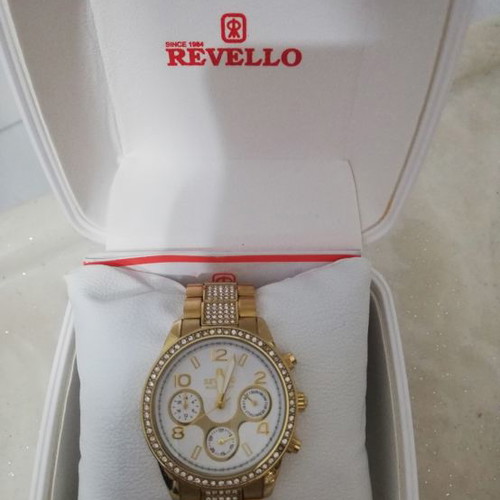 Revello women's watch new, gold color