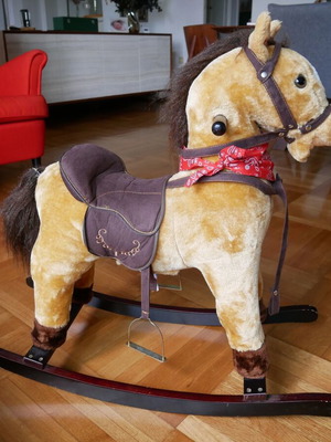 Hoppline rocking horse toy used with sounds and music