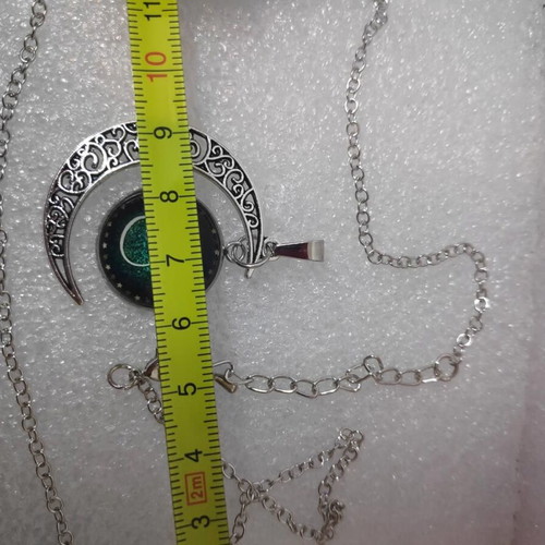 Pendant necklace with Taurus zodiac and crescent moon, like new