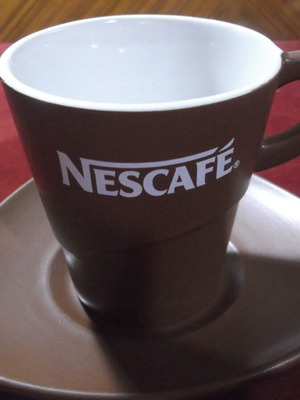 Nescafe collectible ceramic cup and saucer set like new
