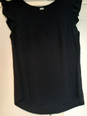 Black blouse New Collection with ruffles and back buttons, like new