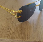 Women's sunglasses, black and gold, new with case