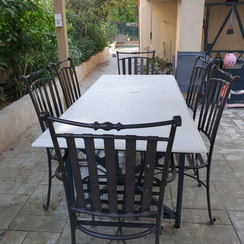 Marble table with 6 metal chairs