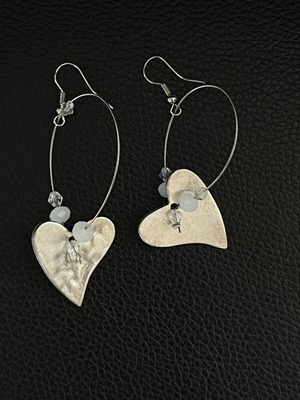 Hammered metal earrings with white beads