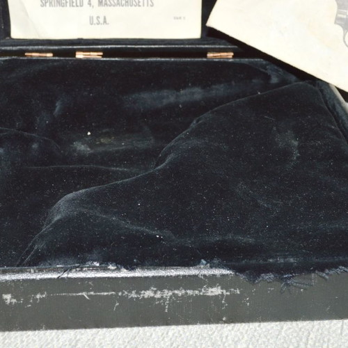 Collectible wooden 0.38 USA revolver case used with velvet lining