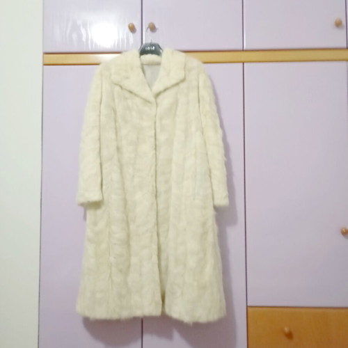 Mink fur coat in off-white and light gray, slightly worn