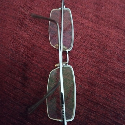 Prada vintage eyeglass frames used, gray metal rectangular shape