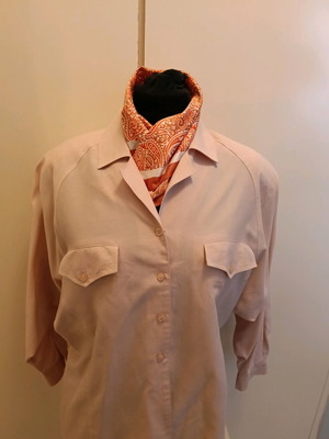 Shirt like new, pale pink with wide underarm and shoulder pads, size L