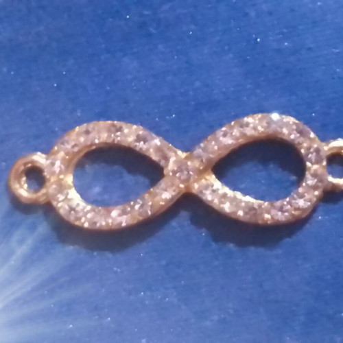 Infinity jewelry connector with rhinestones, gold tone