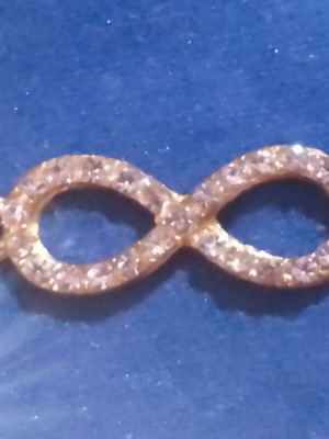 Infinity jewelry connector with rhinestones, gold tone