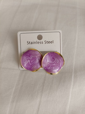 Women's Earrings like new, gold wavy frame with purple marble effect
