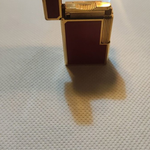 S.T.Dupont lighter like new, gold and red, refillable gas
