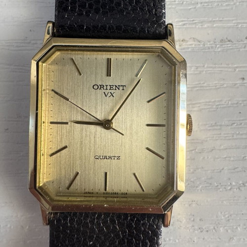 Orient VX Quartz watch, vintage gold rectangular case, brown leather strap