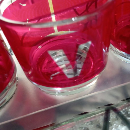 Table decor set with glass tray and 4 glass cups spelling LOVE