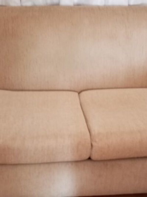 Sofa bed used, two-seater, neutral beige color