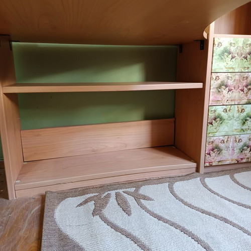 Desk with bookshelf and multiple storage spaces used