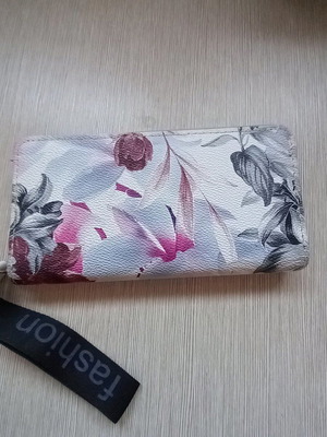 Women's wallet used with floral design
