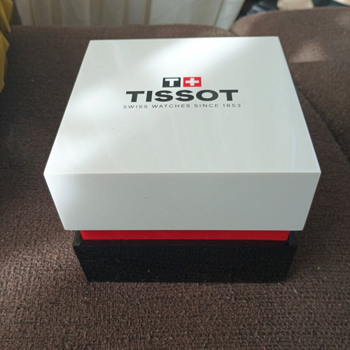 Tissot Classic Gent watch with 18k gold bezel, quartz, new