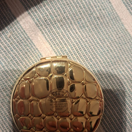 Estee Lauder collectible powder new with gold alligator case