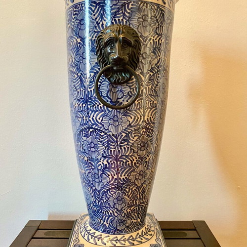 Decorative ceramic vase like new with brass fittings and wooden base