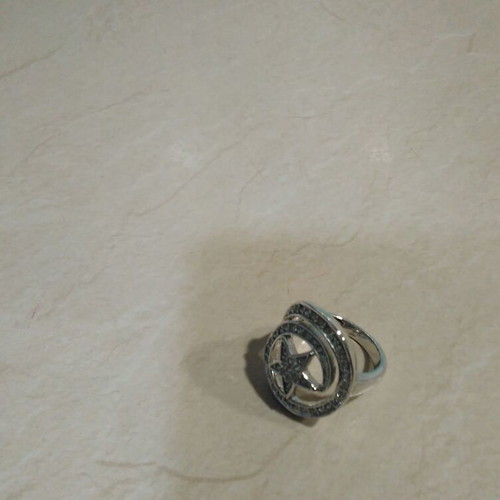 Women's ring with sparkling silver star, like new