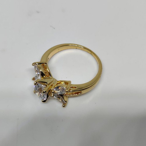 Elegant women's ring with central crystal and decorative petals, like new