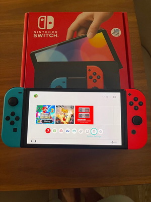 Nintendo Switch OLED 64GB неон син и червен с Super Mario Bros Deluxe