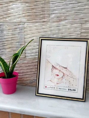 Large black and gold wall frame