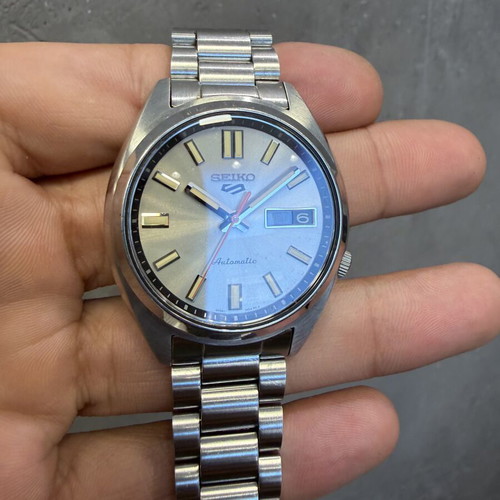 Seiko 5 Sports SNXS Series Automatic watch with silver stainless steel bracelet
