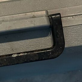 Ergonomic tool case used with latch problem