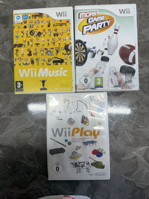 Nintendo Wii Bundle with Wii Party, Wii Music, Wii Play in perfect condition