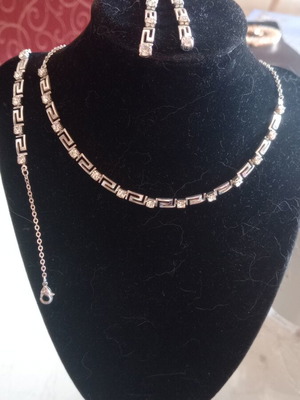 Avon silver necklace, earrings and bracelet set with strass