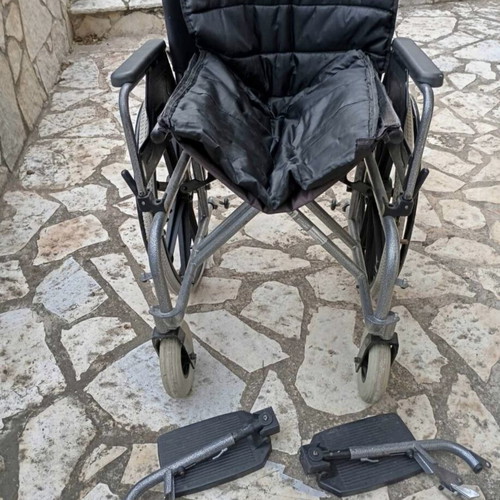 Folding wheelchair, excellent condition