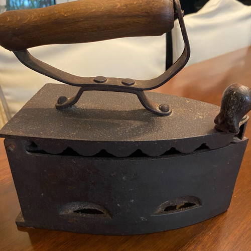 Antique charcoal iron used, cast iron with wooden handle