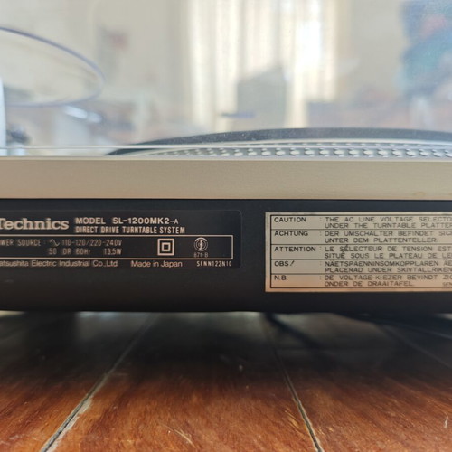 Technics SL-1200MK2 turntable with professional cartridge and dust cover
