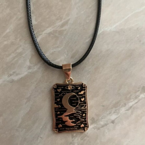 The Moon Tarot necklace like new, black and gold