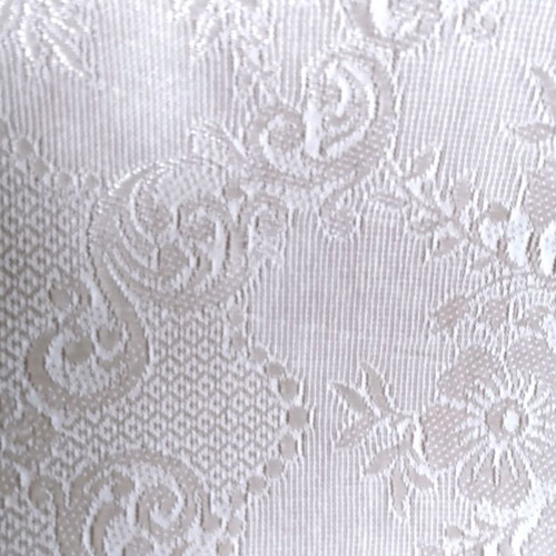 Woven quilt or throw with floral motifs, white
