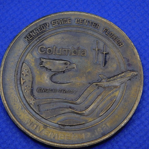 Commemorative metal token with space shuttle, USA