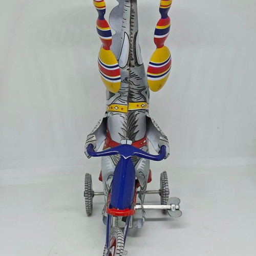 Vintage metal elephant on tricycle like new