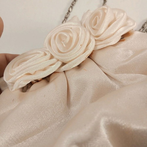 Skondras evening bridal bag used with roses and silver chain