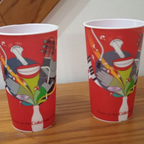 Coca Cola plastic cups used without lids