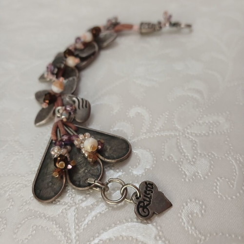 Russa handmade bracelet like new with floral and duck design
