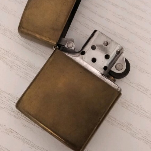Zippo lighter collectible used, bronze color