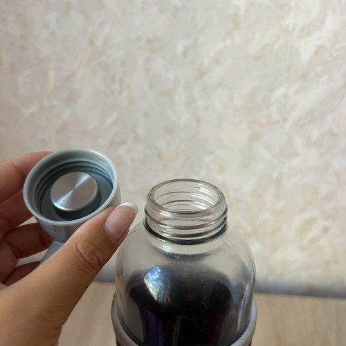 Glass bottle with thermo cover like new